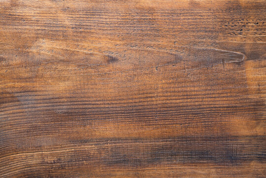 brown wooden plank desk table background texture top view. High quality photo