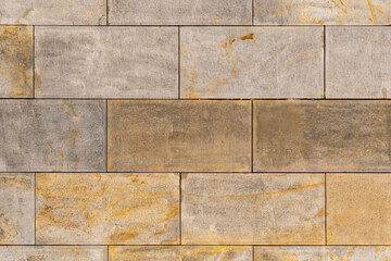 Surface made of regular, precisely laid beige blocks