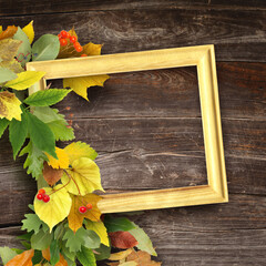 Autumn leaves on wooden background. Frame from leaves with copyspace. Digital scrapbook design. School theme. Back to school
