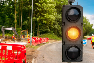 Close-up of the temporary portable traffic light installed to manage traffic flow during roadworks
