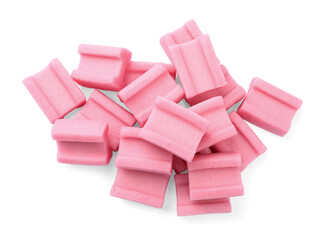 Pile of tasty pink chewing gums on white background, top view