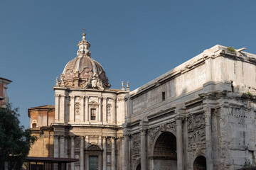 Obraz premium Arch of Titus in the Via Sacra near the Roman Forum in Rome, Italy. Monument made of stone