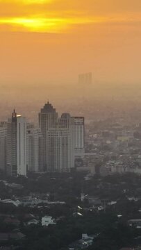 Jakarta with modern buildings at sunset. Urban landscape. Indonesia.