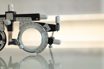Half of prescription glasses for high myopia Eyesight measuring instrument vision care background,...