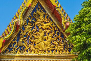 Fototapeta na wymiar Temple Guardians Fighting Pavilion Roof Wat Pho Bangkok Thailand