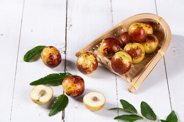 Fresh ripe Jujube Fruits with clipping path on table.