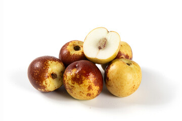 Fresh ripe Jujube Fruits isolated 
 on white background.Sliced of fresh jujubes.
