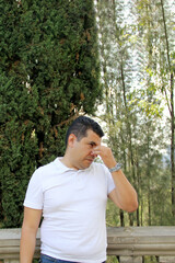 40-year-old dark-skinned Latin man suffers from pain and burning in his eyes due to allergies and...