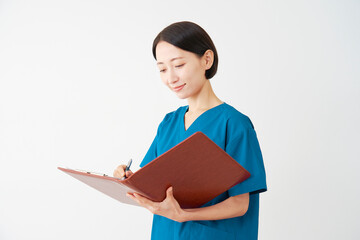 Obraz premium 問診する女性の医者 白背景