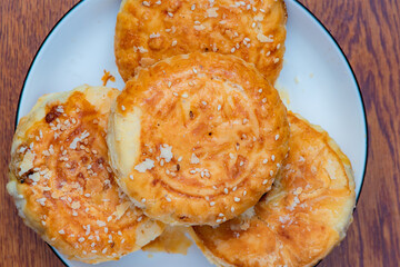 Fruit and Dim sum in the festival, including apples, pomegranates, mud monkey peaches, moon cakes