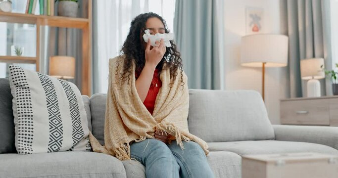 Allergies, sick and woman on a sofa with toilet paper for nasal, cleaning or virus at home. Flu, stress and lady person blowing nose in living room with tissue for viral infection, bacteria or covid