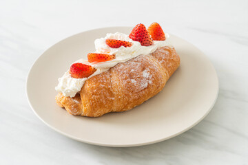strawberry fresh cream croissant on plate