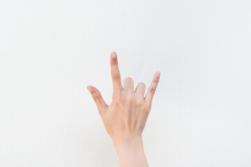 Women showing hand with sign language on white background. Valentine day love concept .