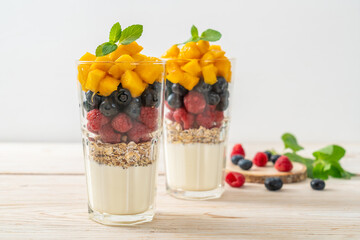 homemade mango, raspberry and blueberry with yogurt and granola