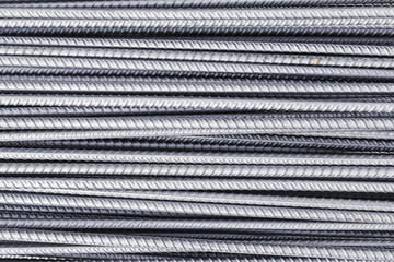 Metal, iron background, set of reinforced steel. Steel armature. Gray new metal fittings. The bars of reinforcement.