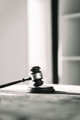 Wooden legal gavel on wooden table, judge hammer for final verdict It represents the rights and...