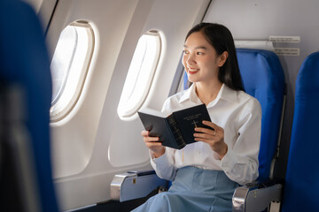 Reading a book, Thoughtful asian people female person onboard, airplane window, perfectly capture...