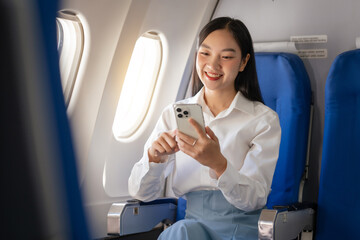 Texting on mobile chat app, Thoughtful asian people female person onboard, airplane window, perfectly capture the anticipation and excitement of holiday travel. chinese, japanese people.