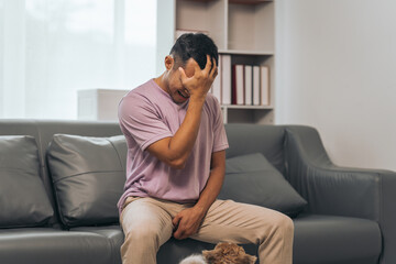 Fototapeta premium Prostate cancer and men's health, Middle-aged Asian Indian man grappling with testicular discomfort. Vivid portrayal of male health challenges, urging awareness and timely medical consultations.