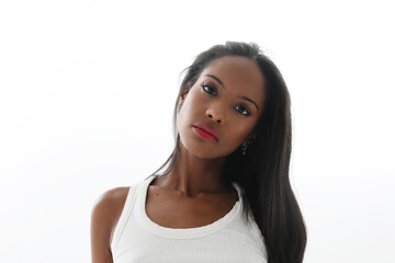 Fototapeta premium Young lovely female has dark skin isolated over white background.