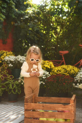 little girl with a bouquet of flowers