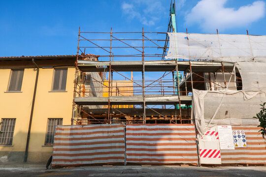 Construction site building house construction scaffold bricks attic panorama