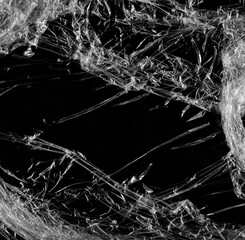 Wrinkled plastic wrap texture on a black background wallpaper. Royalty high-quality free stock photo image of realistic plastic wrap for overlay, copy space and photo effect. Wrinkled plastic surface