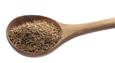 Anise seeds spice (Pimpinella anisum) in wooden spoon isolated on white  