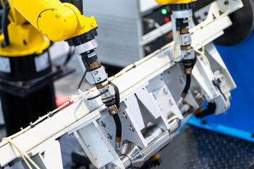 robot arm working in car factory