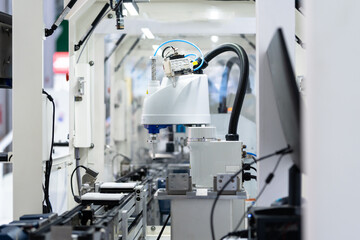 robot arm working in car factory