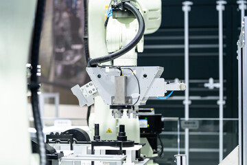 robot arm working in car factory