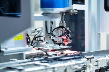 robot arm working in car factory