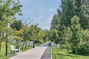 Alley with path for jogging in historical park Black Lake, Kazan, Russia.