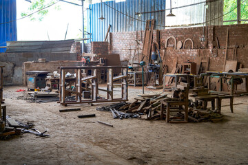 A busy and messy furniture processing factory