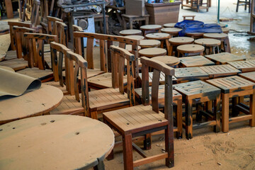 A busy and messy furniture processing factory