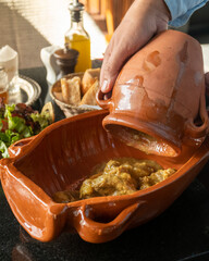 Delicious traditional Moroccan Tanjia dish, served with Moroccan tea ,salad and bread