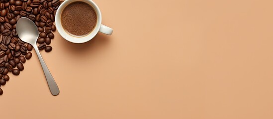 Two coffee filled spoons on a isolated pastel background Copy space one with beans and the other with ground coffee while an adjacent coffee bean lies nearby