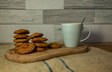 home made coockies with a coffe cup and spoon