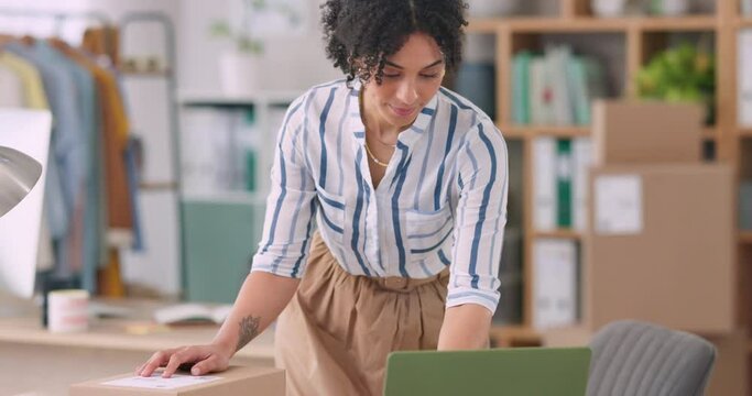 Woman, computer and package for e commerce in office, stock order or product courier of online shop. Startup, fashion designer or small business owner with boxes, laptop inventory or clothes delivery