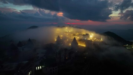 Aerial view of  Ba Na Hills, with beautiful castles, buildings, streets and campuses at the famous tourist destination of Da Nang, Vietnam. Near Golden bridge