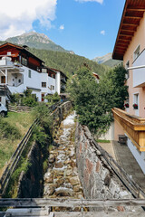 Little river in the village of Fulpmes, western Austria