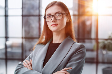 Dream big and make it happen. Portrait of a confident young businesswoman standing with her arms crossed in an office.