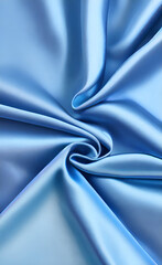 Dark blue silk fabric background, view from above. Smooth elegant blue silk or satin luxury cloth texture can use as abstract background with copy space, close-up