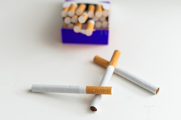 Cigarette on white background, unhealthy lifestyle, toxic nicotine