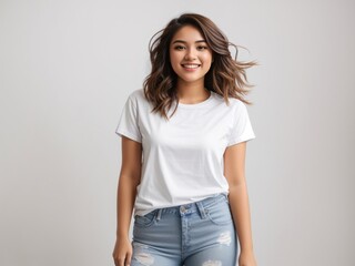 Casual Elegance: Young Happy Woman in White T-Shirt and Jeans