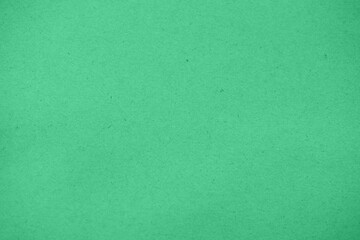 Green corrugated cardboard texture background. Green paper cardboard with a soft color. Blue corrugated cardboard texture is useful as a background.