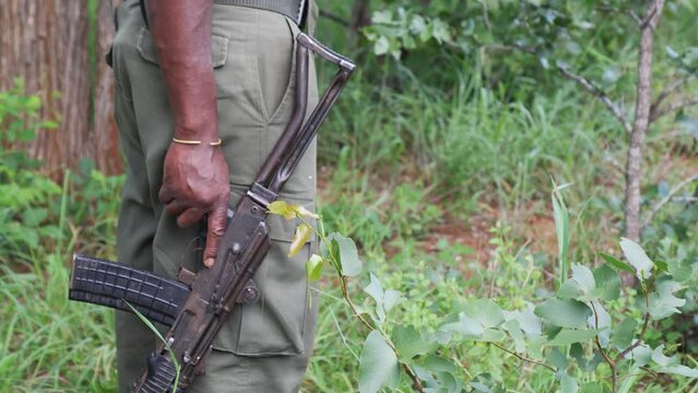 Close-up of a ranger with a rifle in Mozambique, Africa