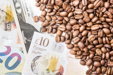 Coffee prices texture. Price of beans. Coffee seeds export. Money banknotes. Euro, pound, dollar currency. Black morning coffee beans. Cash payment. Coffee industry background. Cost of roasted seeds.