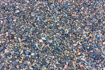 Fine granite crushed stone its texture and background.