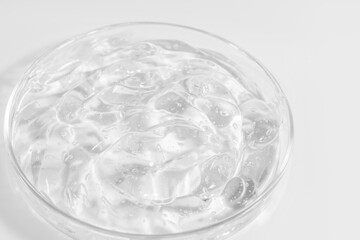 transparent cosmetic or medical gel in a Petri dish